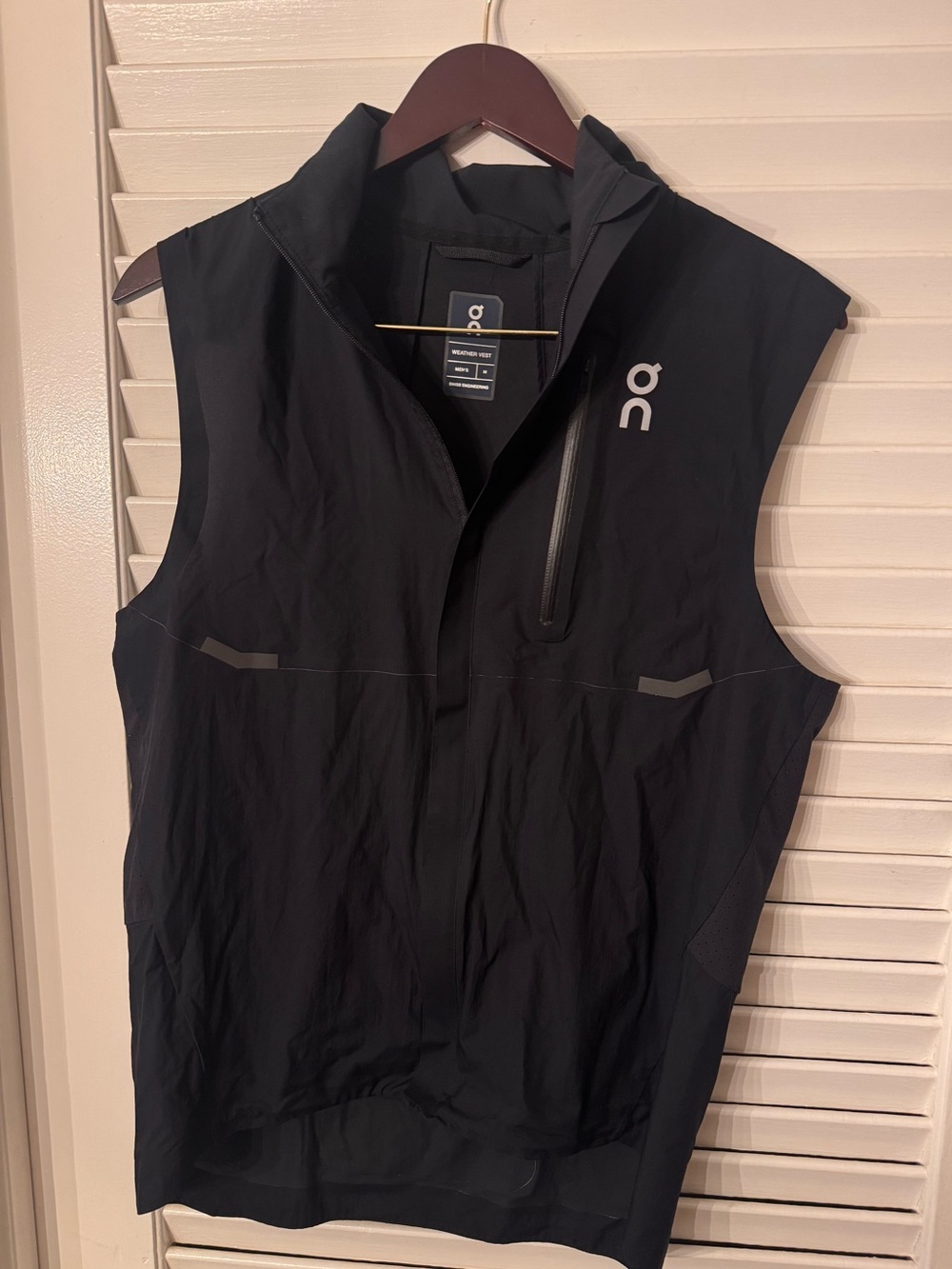 On Running Black Weather Vest perfect layering with small zipper pocket